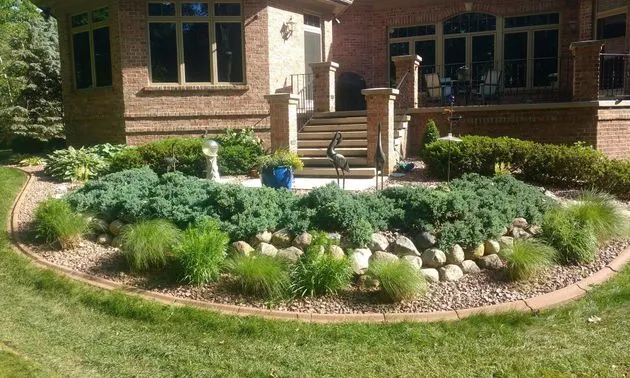 Landscaping and hardscaping project by JM Landscaping LLC in Green Bay, WI