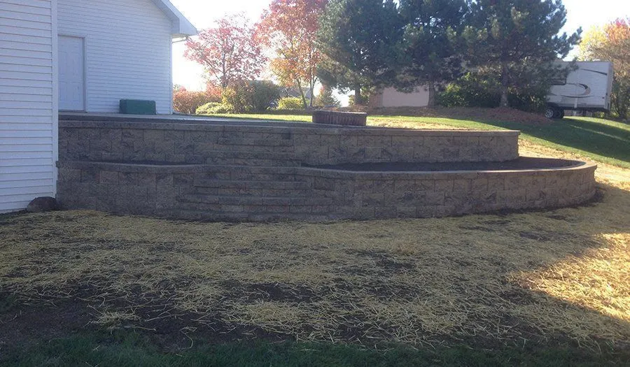 Retaining Walls Installation project by JM Landscaping LLC in Green Bay, WI
