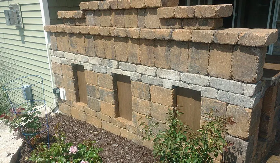 Retaining Walls Installation project by JM Landscaping LLC in Green Bay, WI