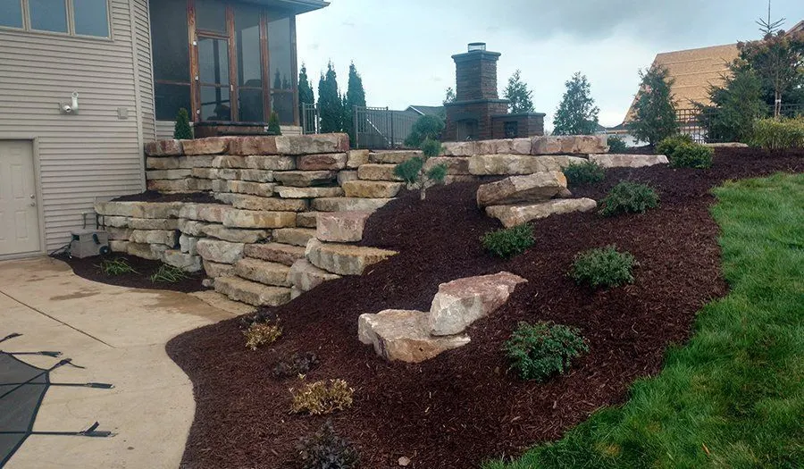 Retaining Walls Installation project by JM Landscaping LLC in Green Bay, WI